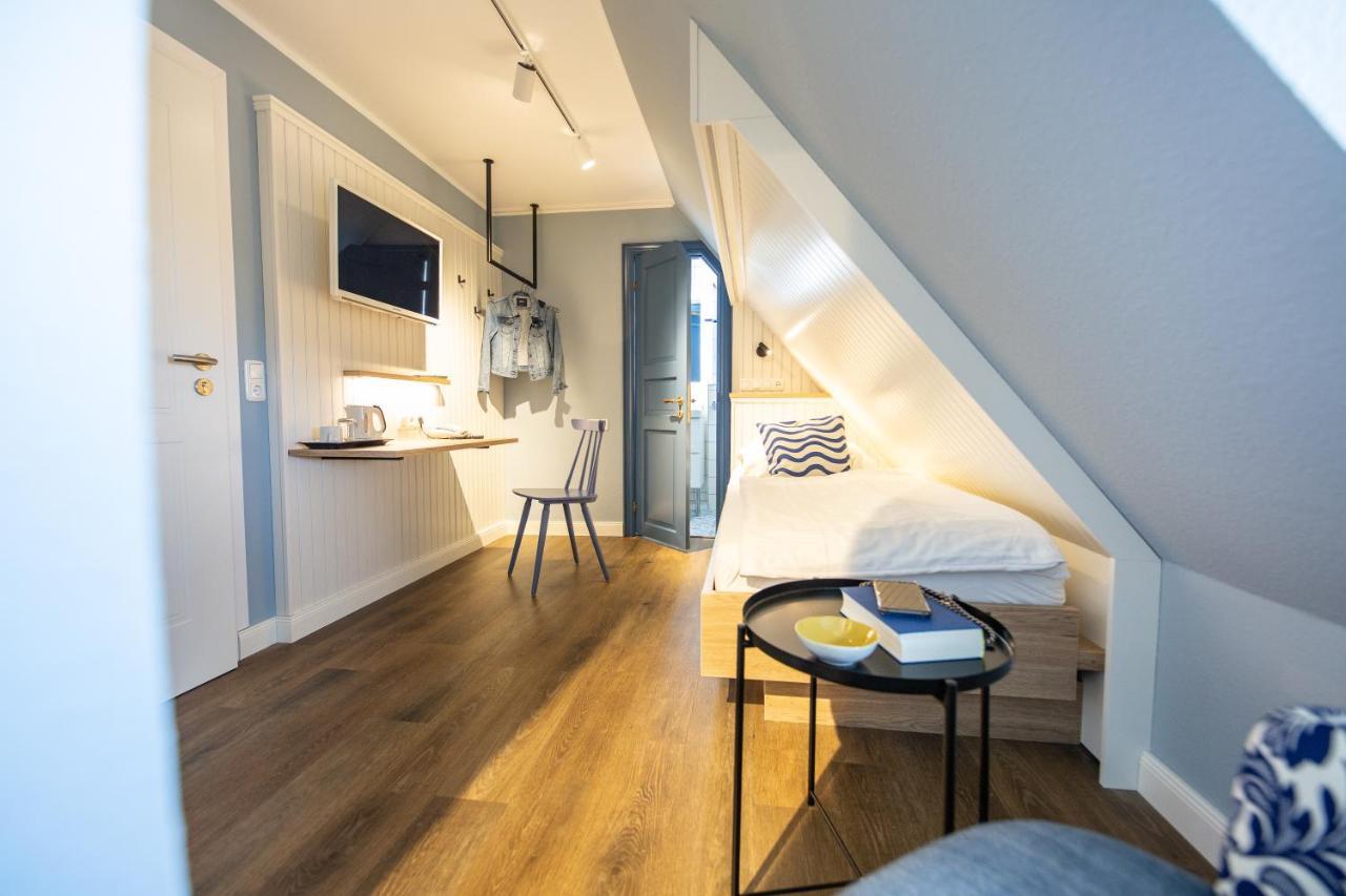 Ual Oeoemrang Wiartshues Hotel Norddorf Bagian luar foto